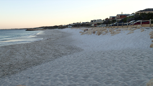 Image of beach showing sand erosion